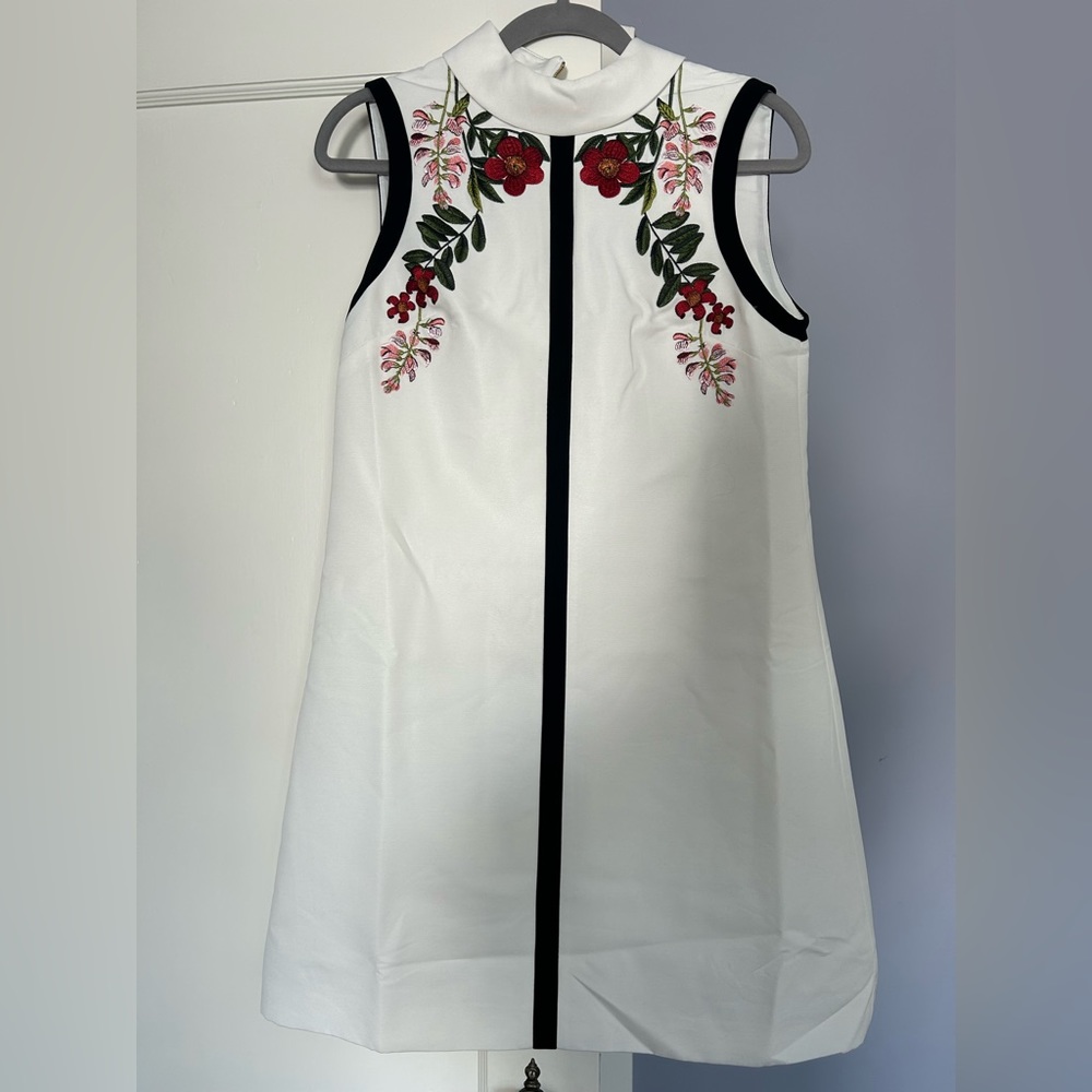 Ted Baker collared tunic, lovely floral detail. Never worn with  tags. Size 2.